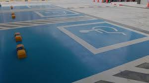 Prix pour créer un marquage au sol de parking en peinture routière avec création de places PMR à Brive la Gaillarde